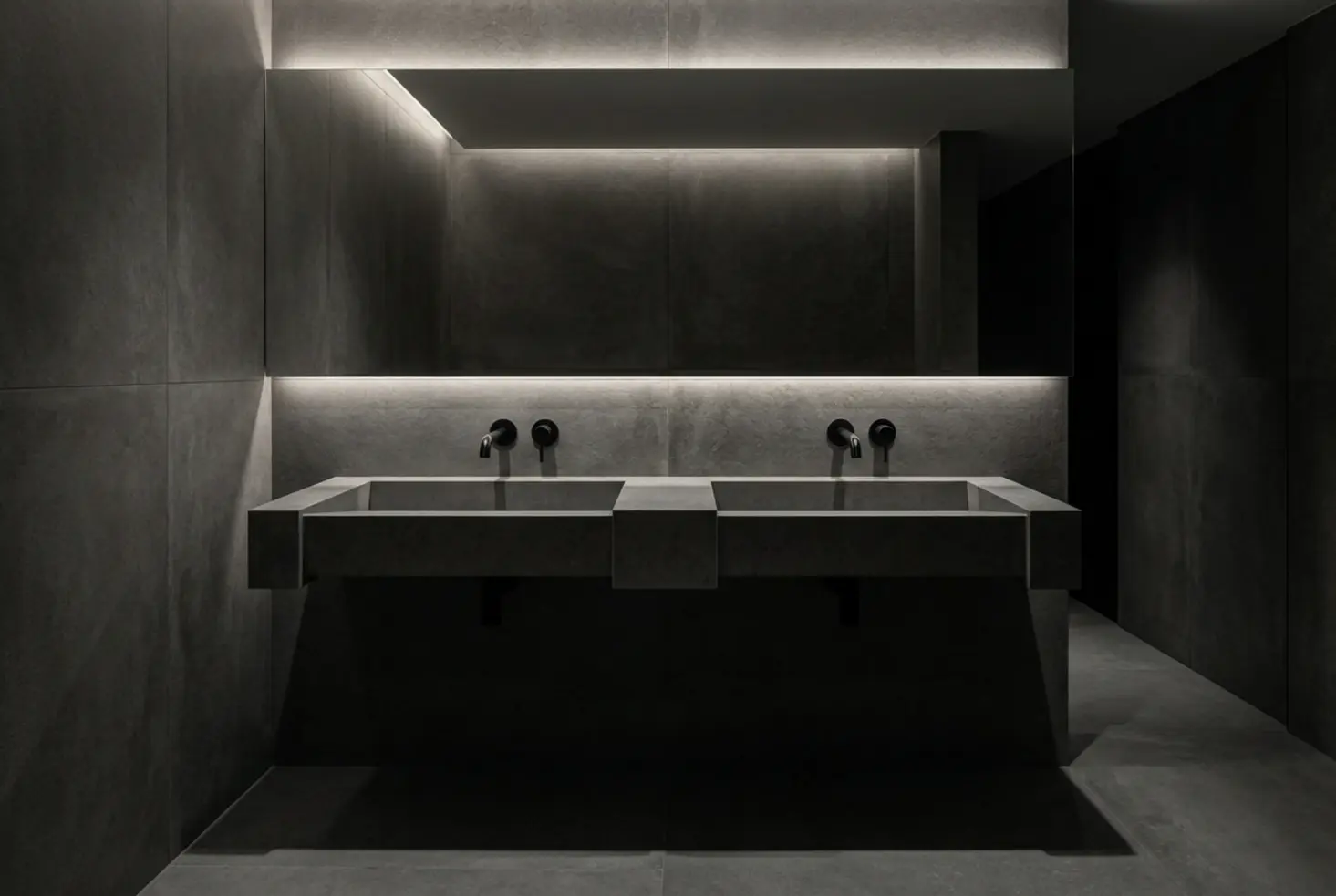 Diseño de baño monolítico en porcelánico de gran formato y estilo industrial de lujo